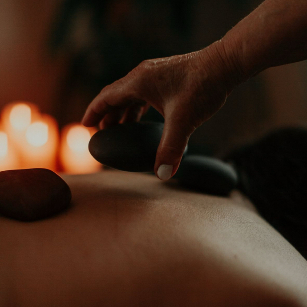 Hot Stone (ADD ON) To Any Massage at The Waxing Coven in Harrisburg, PA