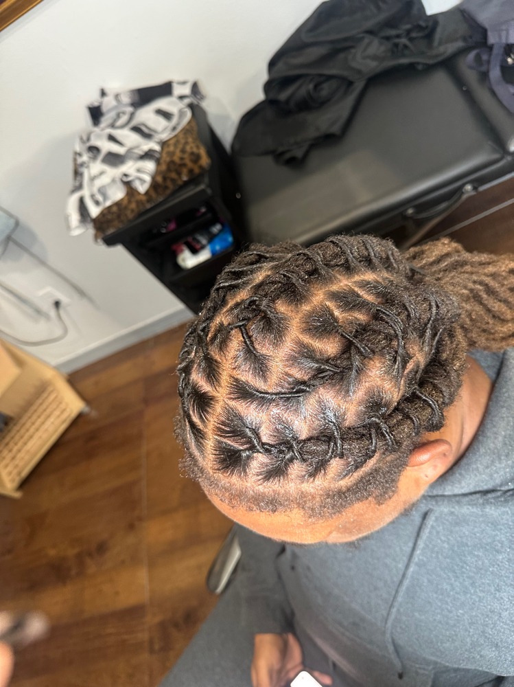 Retwist: Crown/ under 50 locs at BeautyQueen in Houston, TX