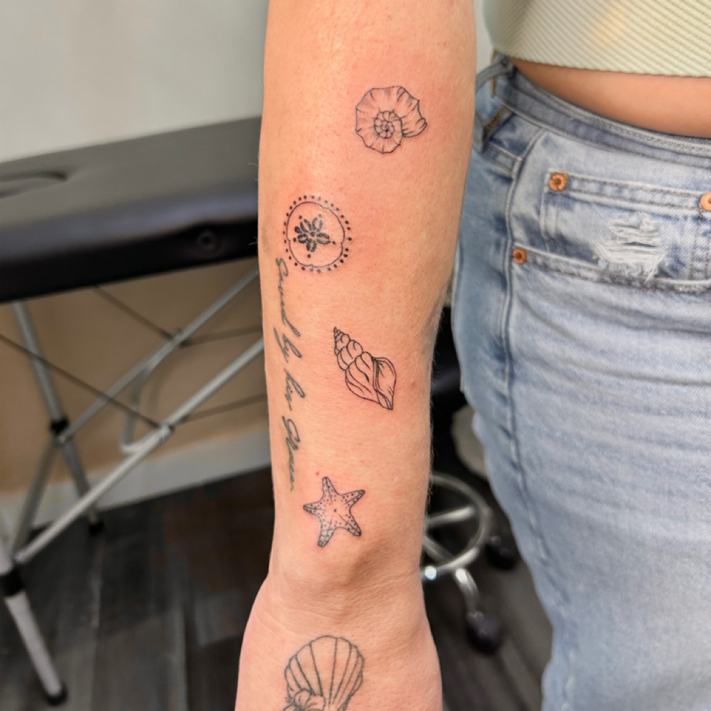Fine Line Sticker Sleeve Tattoos at The Beauty Loft in Sunnyside, WA