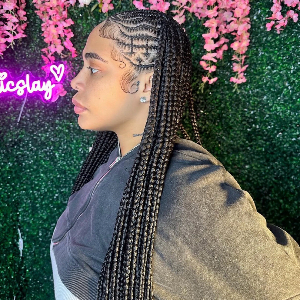 tribal braids (small knotless 4 bac at Exotic Slay in lanham, MD