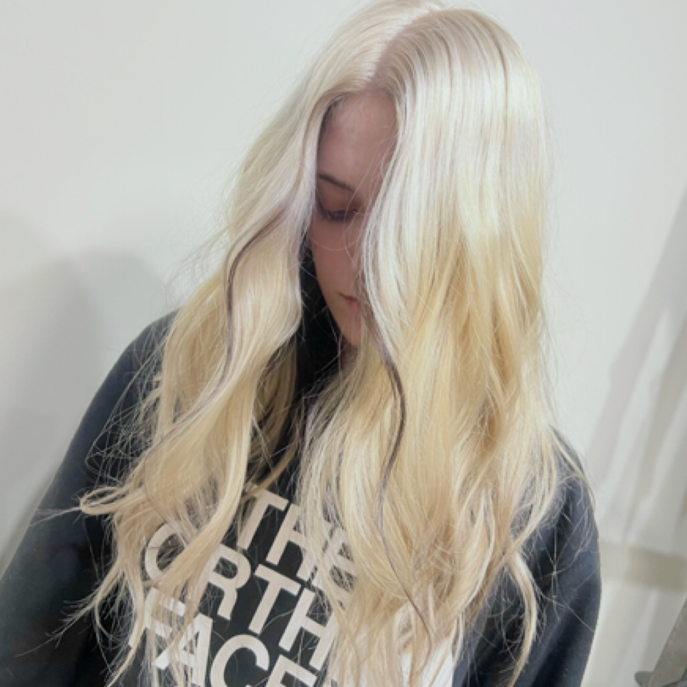 “A Bleach & Tone 💁🏼‍♀️” at Raini @ Hallowed Roots Hair Co. in Waynesville, NC