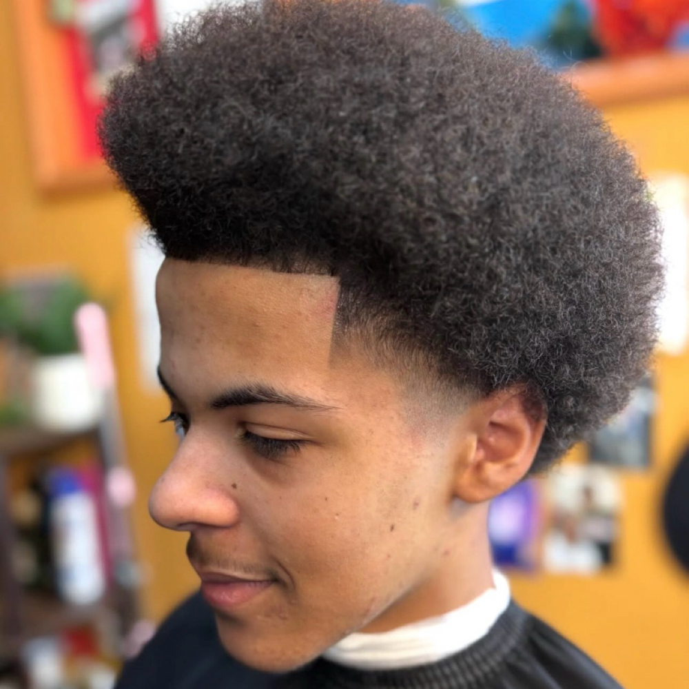 Teenagers Haircuts (ages 13-17) at Smiley tha Female Barber in Cincinnati, OH