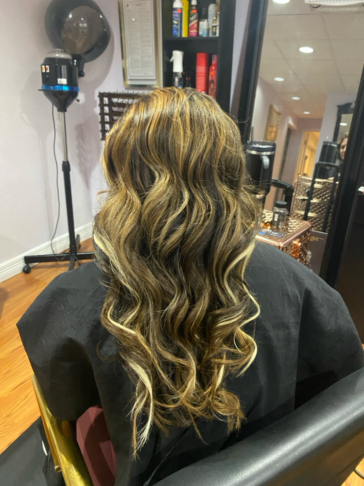 Traditional Sew-in With Leave Out at Dream Beauty Lounge in Oklahoma City, OK