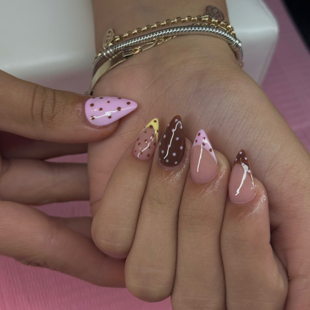 Short Full Set at Couture hair and day spa in Rock Falls, IL