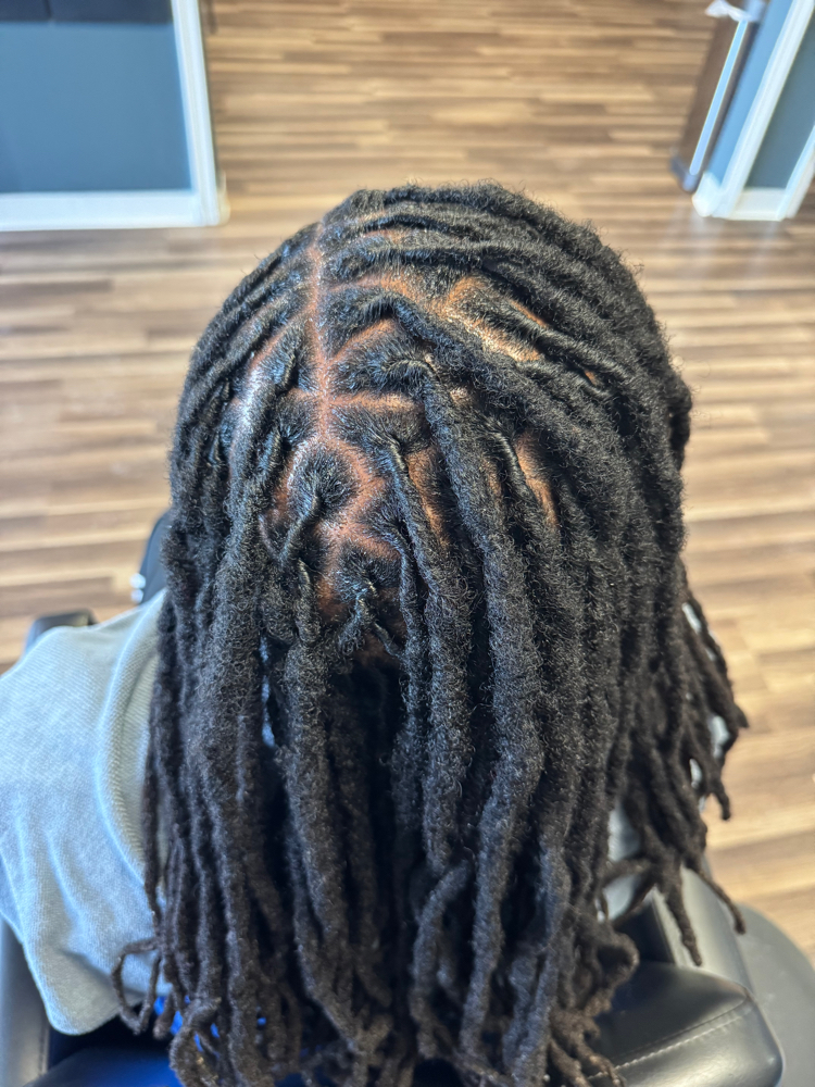 Loc Retwist at Ashley Nicole's Beauty Bar in Oxon Hill, MD