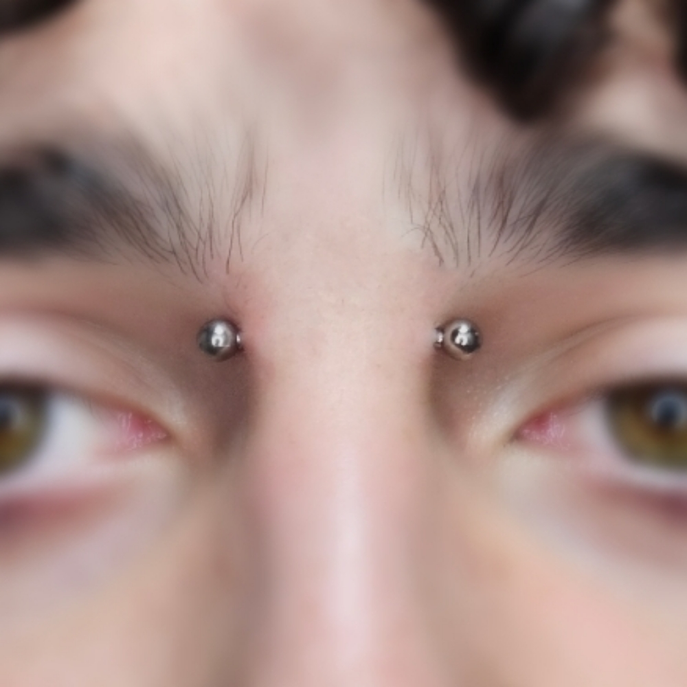 Bridge Piercing at Chrissy Von in Pelham, NH