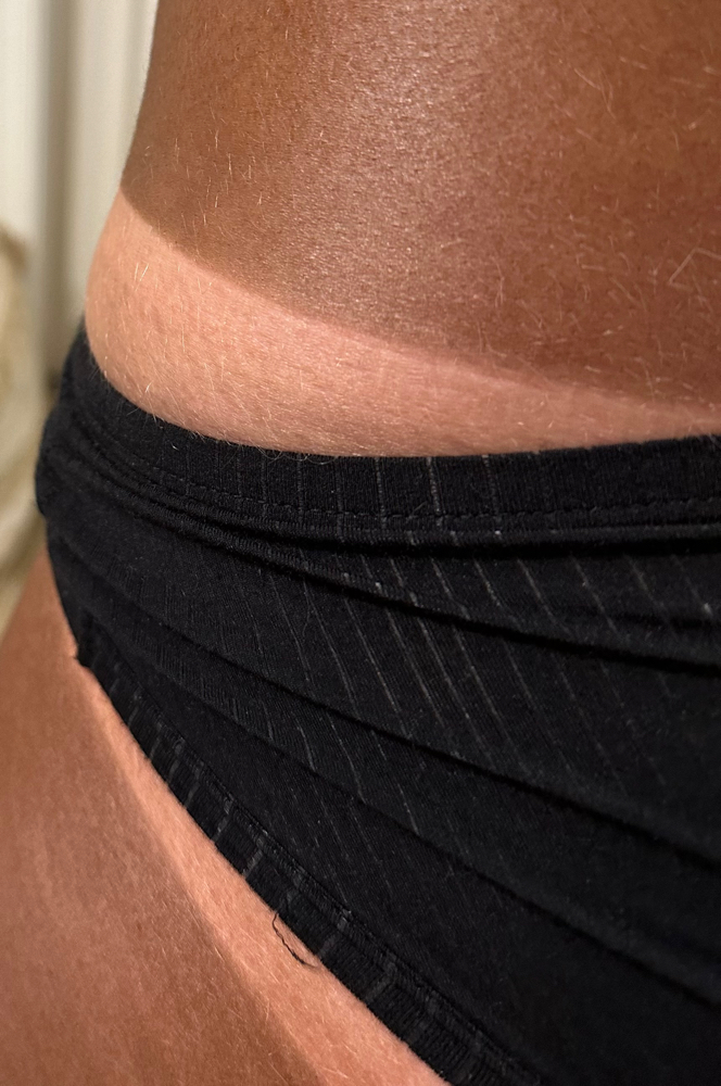 Lightly Toasted Sunless Tan at Aesthetically Adelina in Murfreesboro, TN