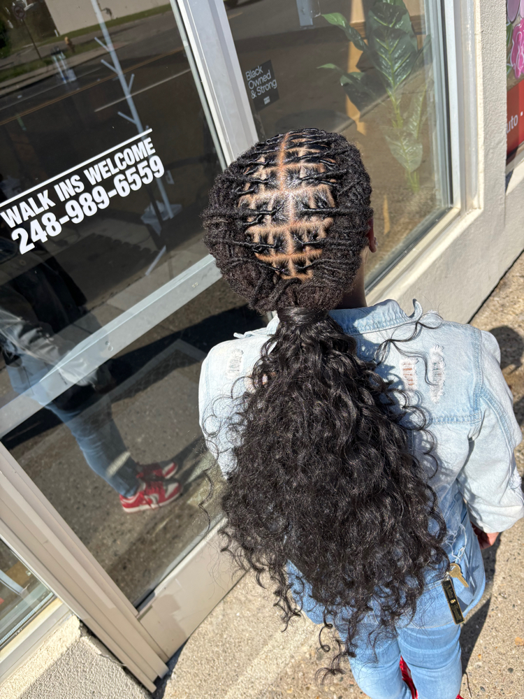 Loc Ponytail at Queen Of Diamond Locs in Detroit, MI