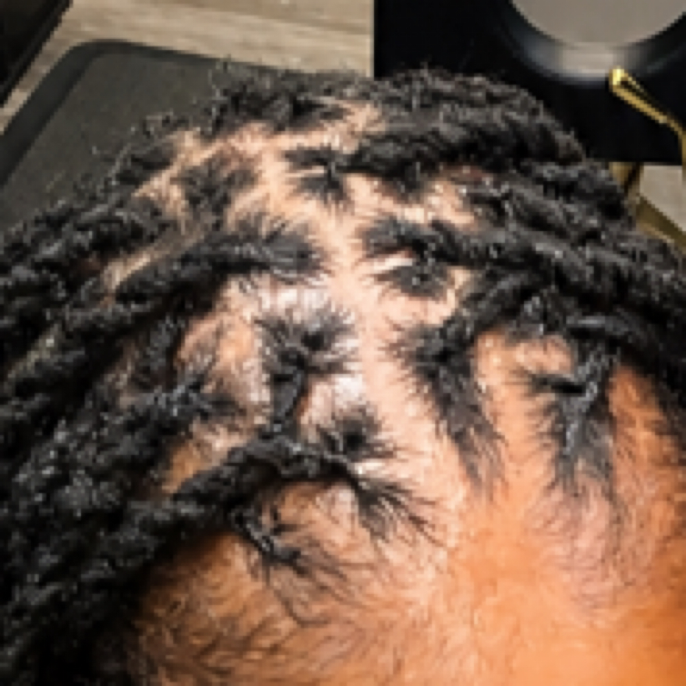 Interlocking at DeLisha Doin’ Locs Well in Charlotte, NC