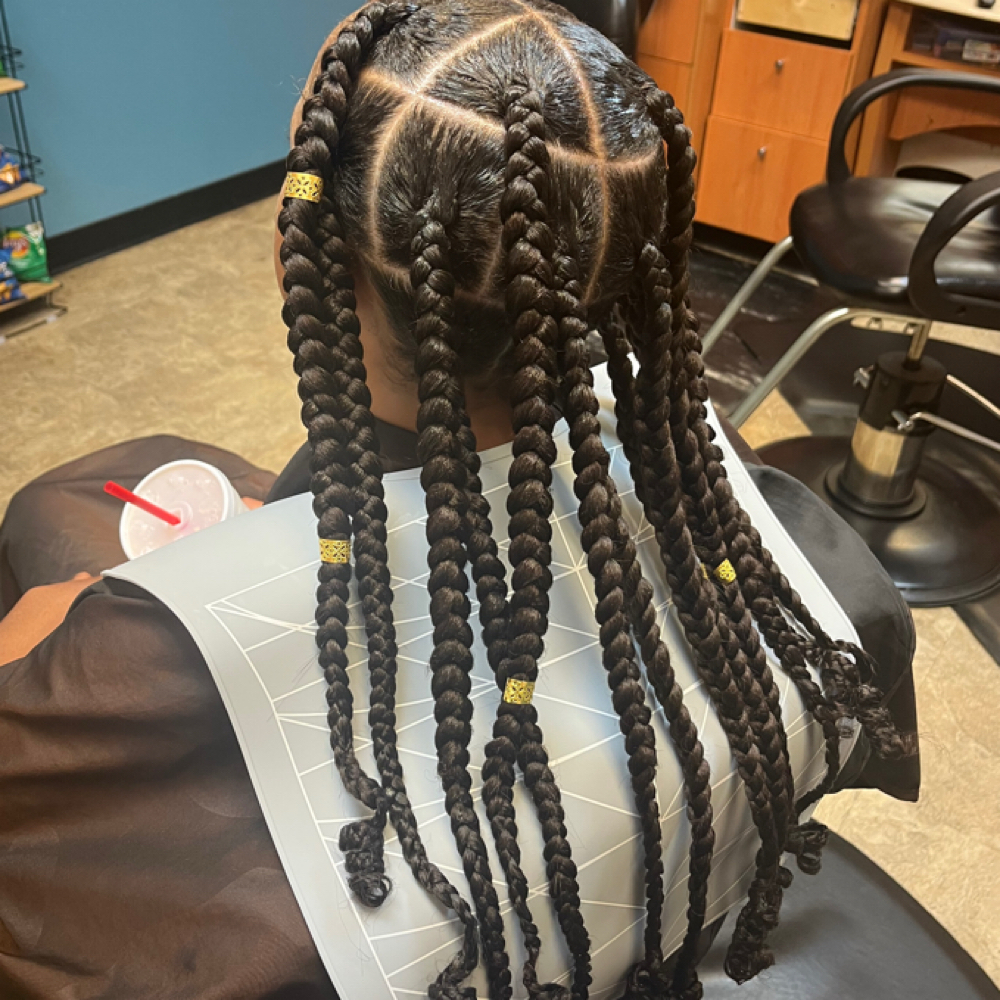 Large Individual Braid Style at Hair By ElahVee in Omaha, NE