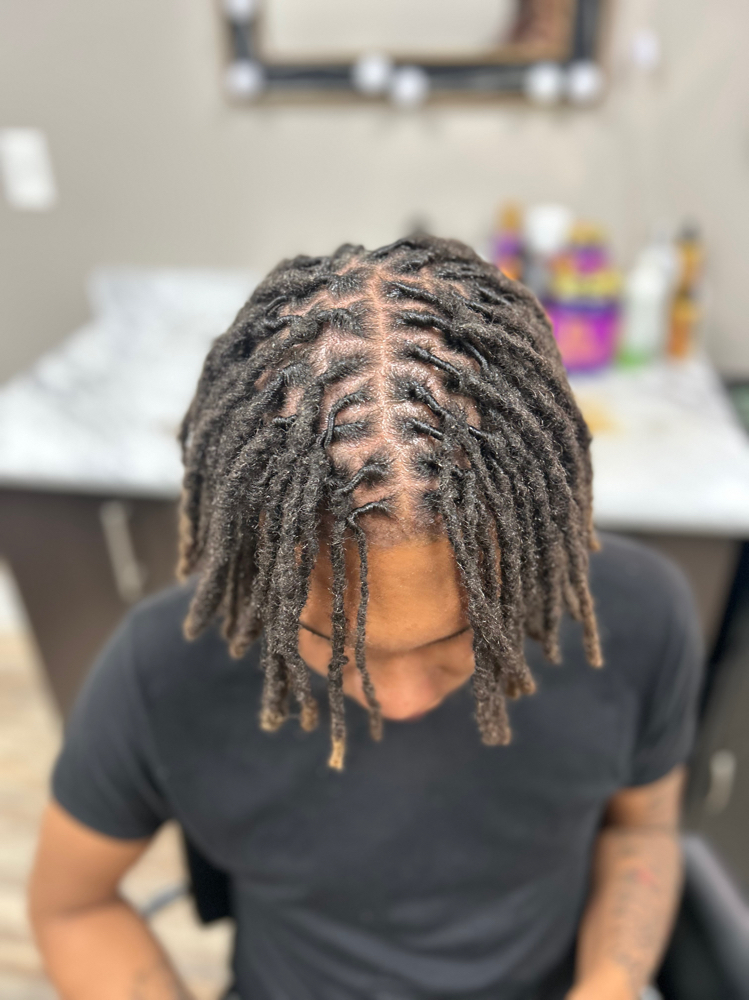 Loc Retwist at Ja’Tae Style Studio LLC in Euclid, OH