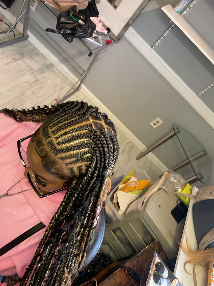 Fulani Knotless Braids at The Hairapist Experience in Mount morris, MI