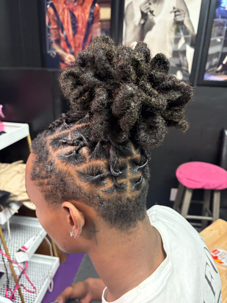 Flower Petal Bun at Raven  Lewis in Montgomery, AL