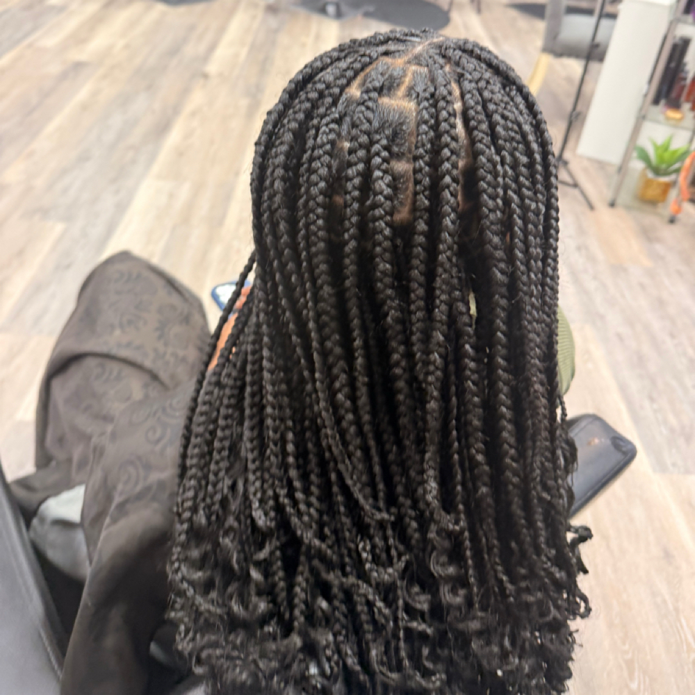 Small Knotless Braids at Mane In The Mirror Salon in Charlotte, NC