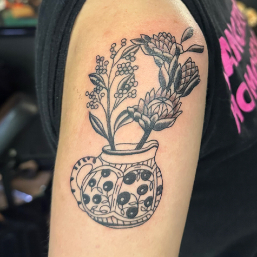 $50 For 2 Flowers and a Vessel at Big Lew’s Tattoos in Indianapolis, IN