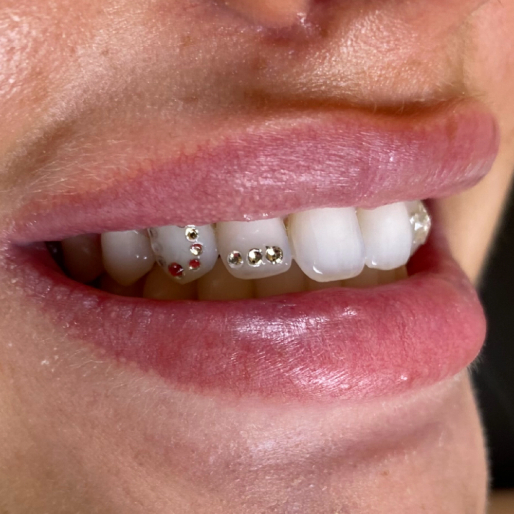 tooth gem (1 or more gems) at Lillian Claire Lash & Brow in Portland, ME