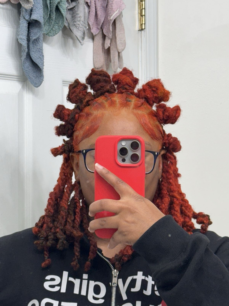 Half Up, Half Down Bantu Knots at Estrebeautyy in Columbia, MO