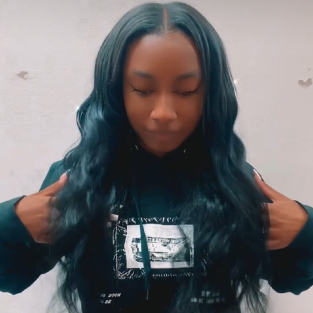 Sew-in with leave out at The collective salon and barber spa inc in Locust Grove, GA