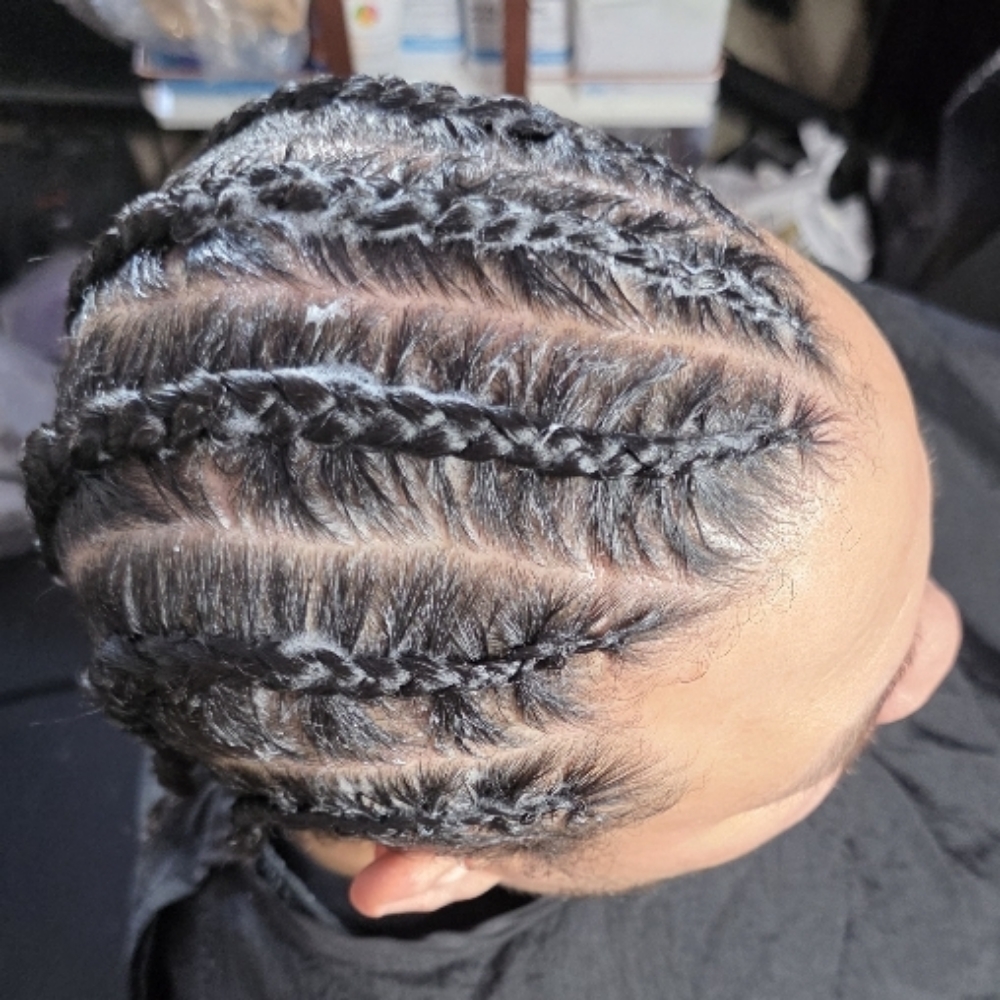 STRAIGHT BACK BRAIDS at Tijuju Hair in New York, NY