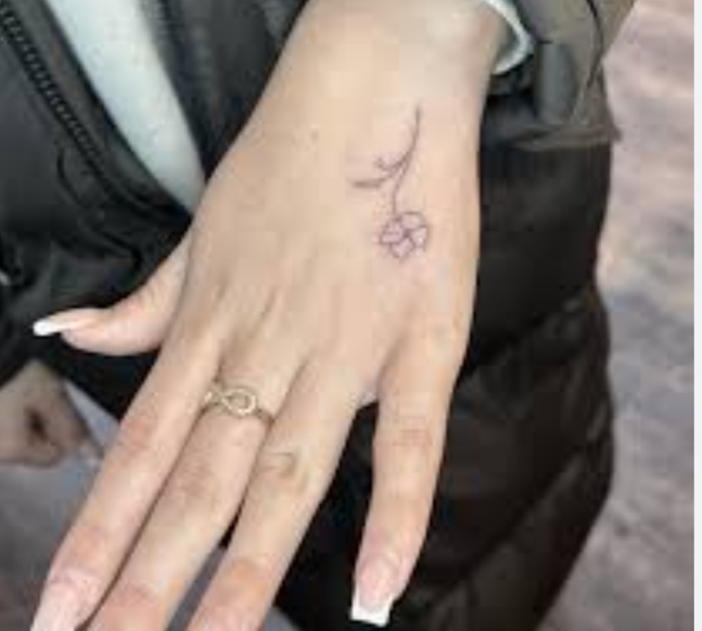 Fine Line Tattoo
