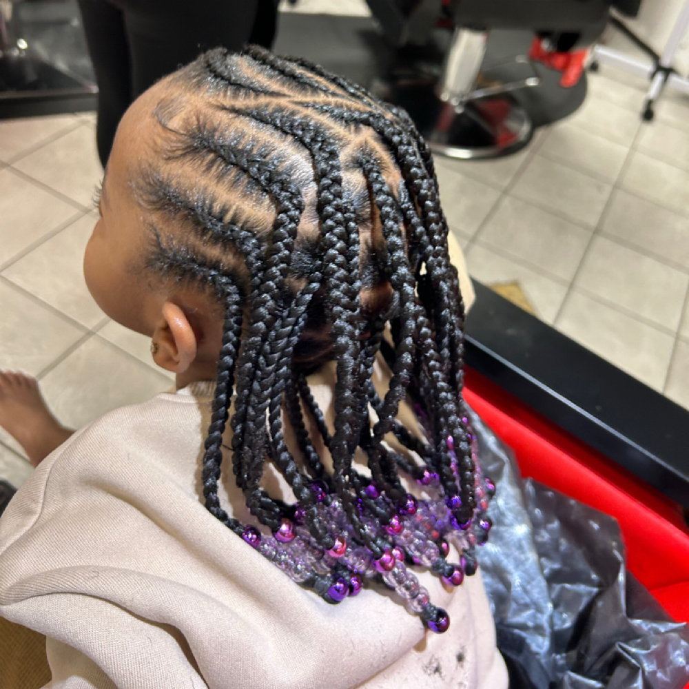 Kids Braids With Weave (Certain Cornrow) Style at Madame Jay Salon in Freeport, NY