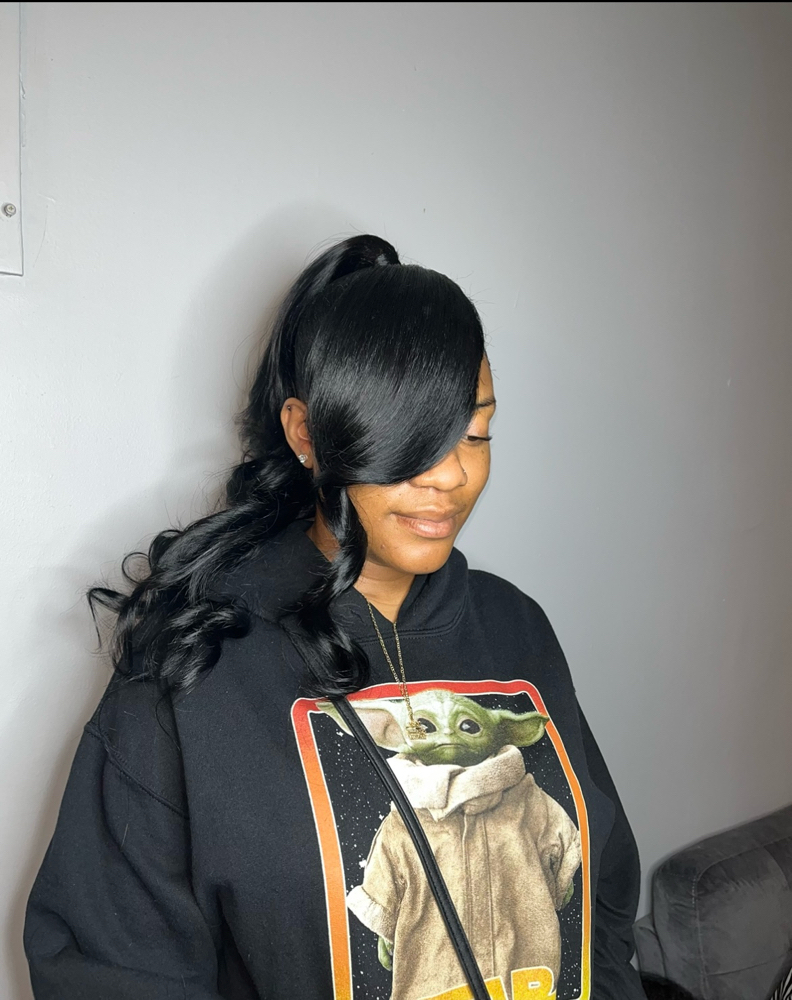 Ponytial W/ heavy Bangs .