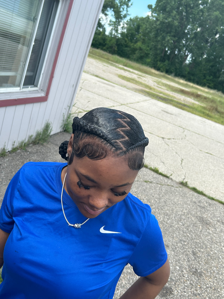 2 braids with zigzags /2 buns at The Hairapist Experience in Mount morris, MI