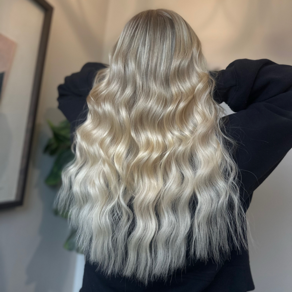 Hair extension 2 row move up at Salon Sylvia in Franklin, WI