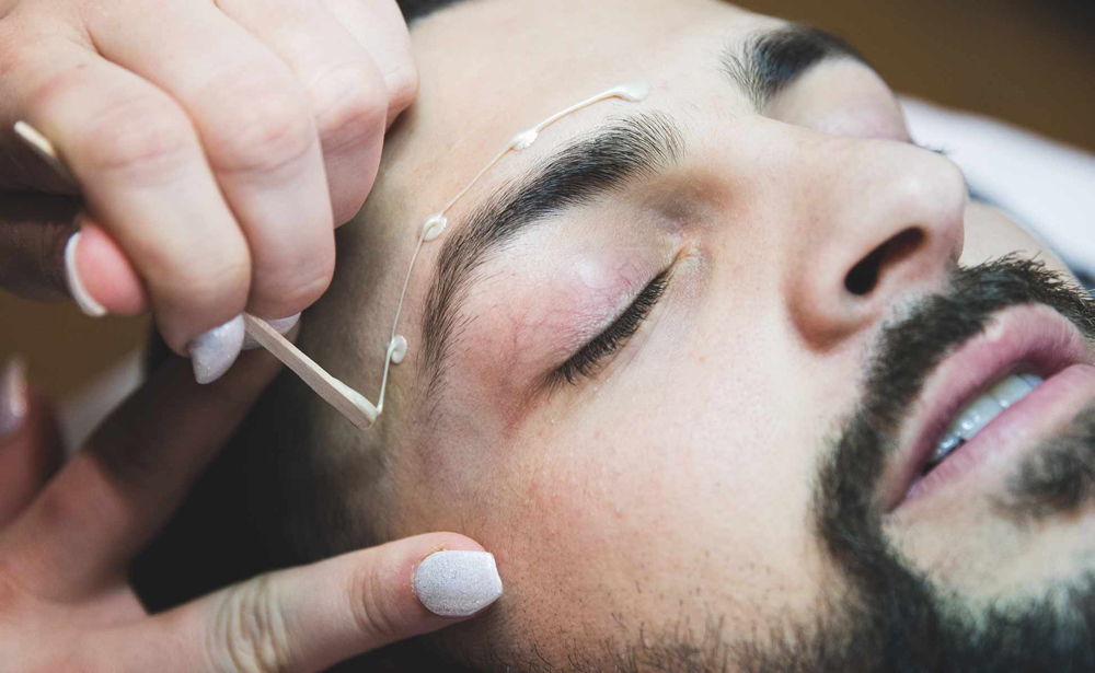 Just the middle eyebrow wax for men