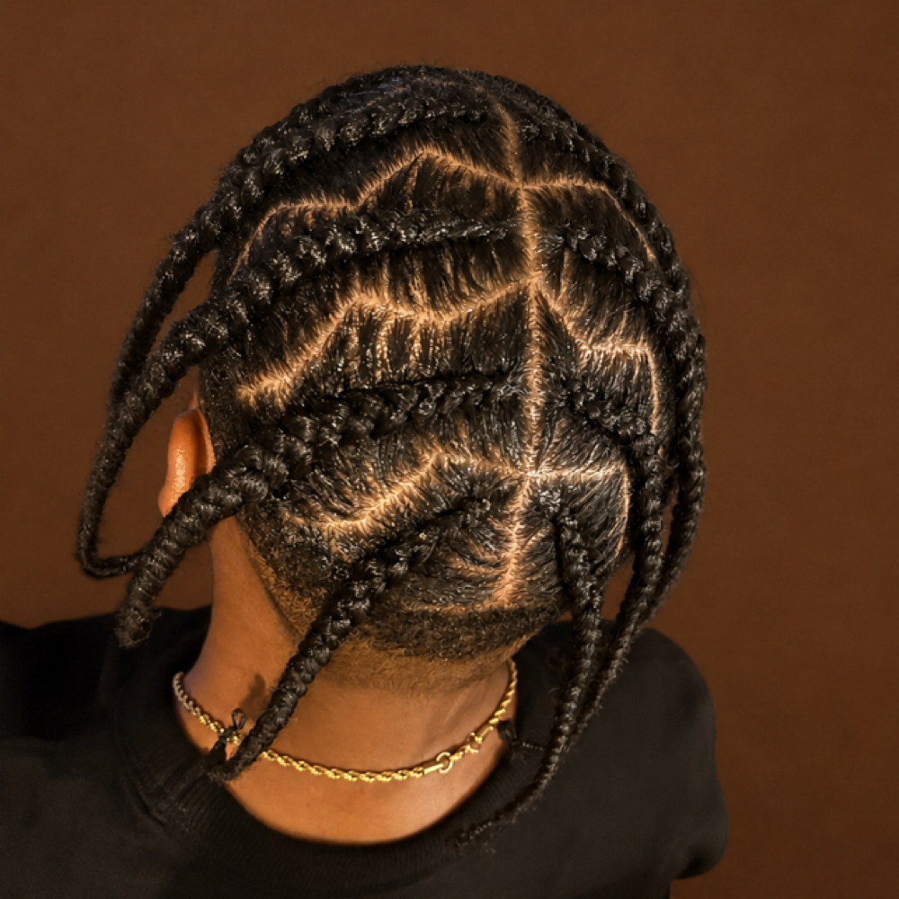 Men Braids at SHE Shop Co. in Lansing, MI