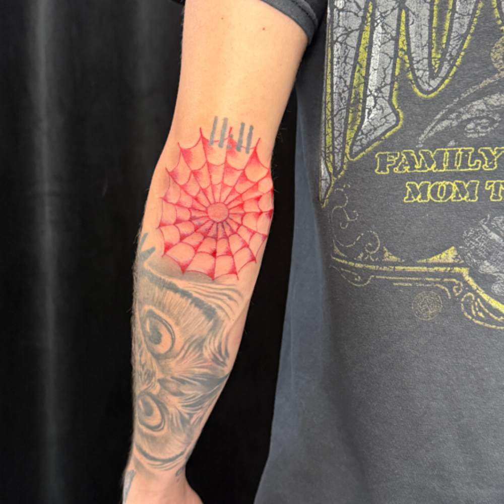 Red ink Fineline Tattoo at Jes P Beauty in Joliet, IL