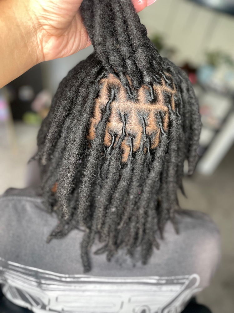 Loc retwist at The Charmaine Effect in Charlotte, NC
