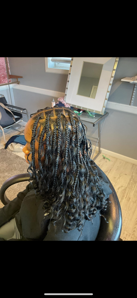 Smedium bohemian knotless bob at The Hairapist Experience in Mount morris, MI