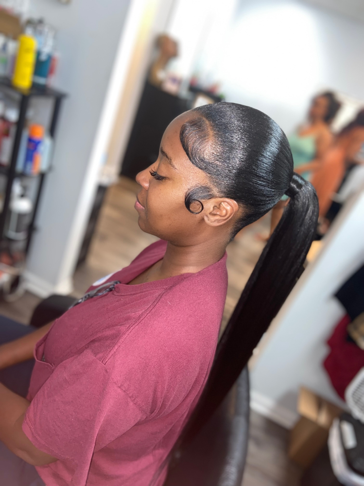 Sleek low or MidHigh Ponytail