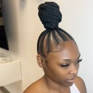 Braided Top knot bun at Loreign Creationz in Laurel, MD