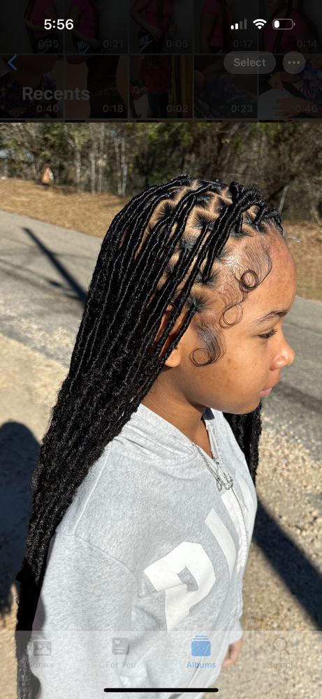Knotless Soft Locs at HAIRBYREYA in Monroeville, AL