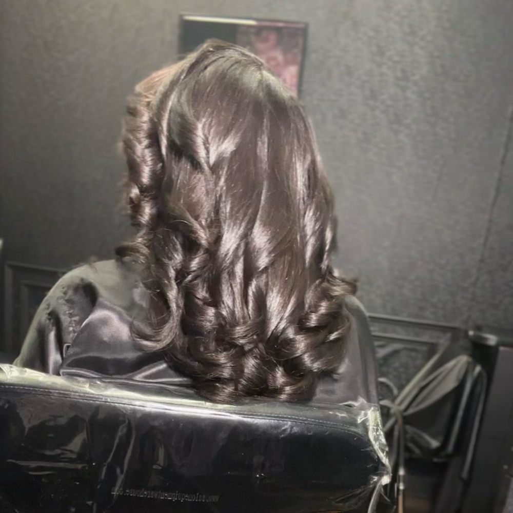 The Queen Silk Press at The Royale Touch Hairtique in Houston, TX