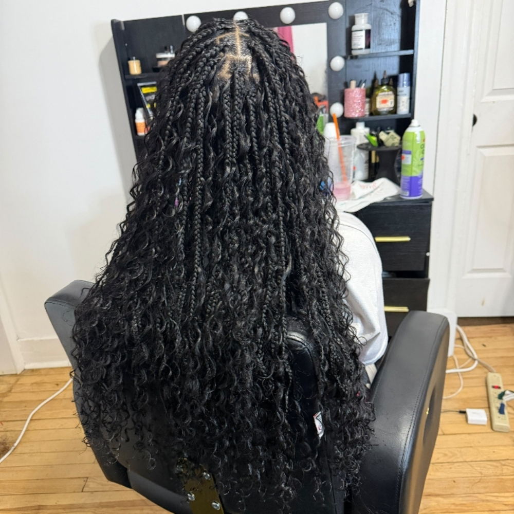 Medium mid back boho braids at HairByQweenCoda in Bridgeport, CT