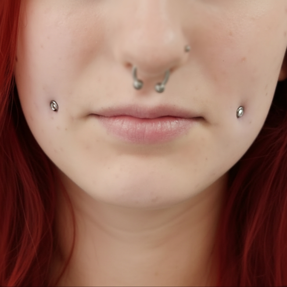 Cheek Piercings at Chrissy Von in Pelham, NH