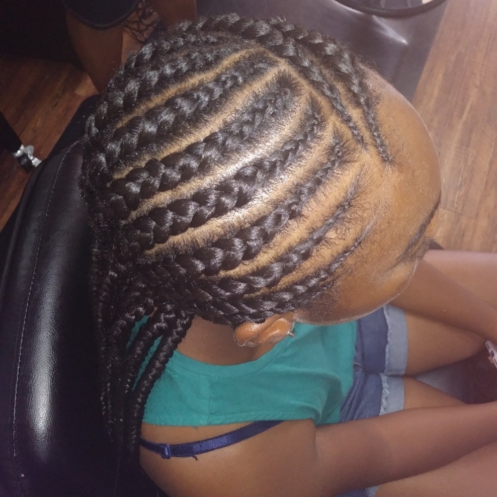 feed in cornrows at Styles By Carrera in Las Vegas, NV