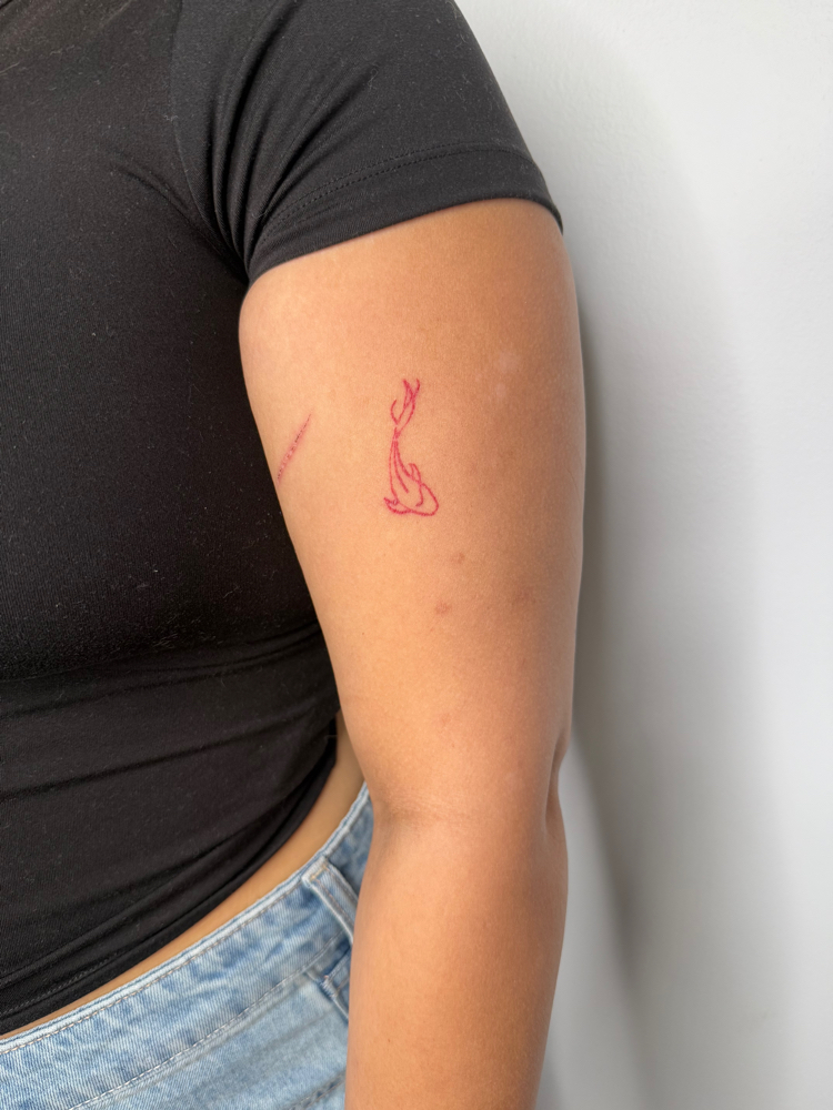 Fine Line Tattoo