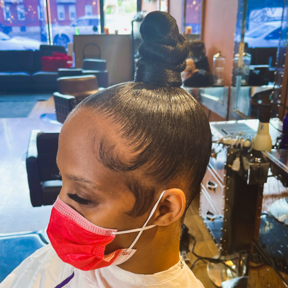 Top Knot Ponytail at Ephraim Salon Chicago in Chicago, IL