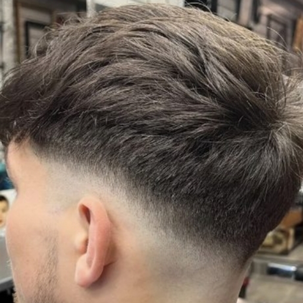 Drop Tapper Fade at Rock Clipper Scissor in Appleton, WI