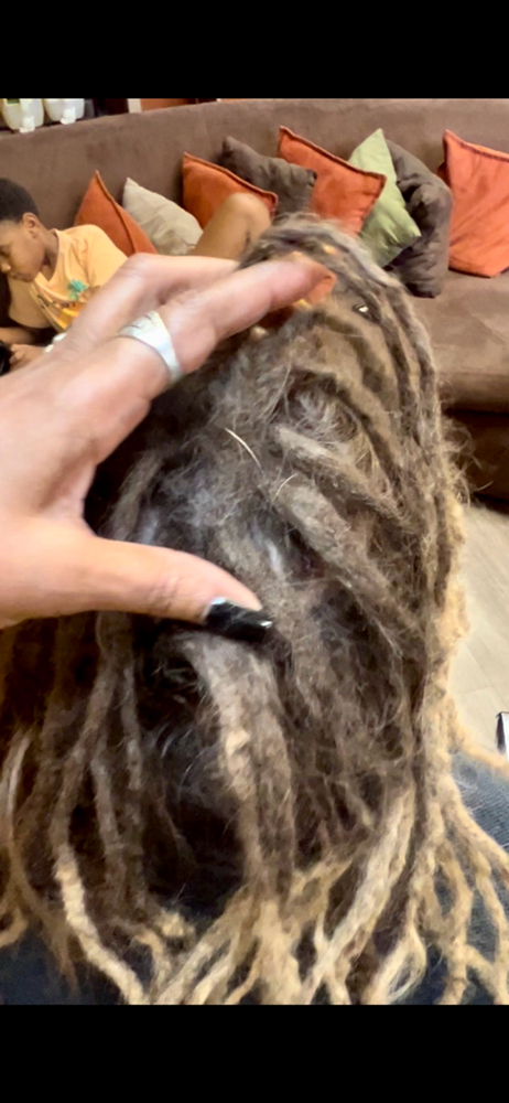 Detangle Loc Roots Only at U N I FOR HAIR LLC in North Charleston, SC