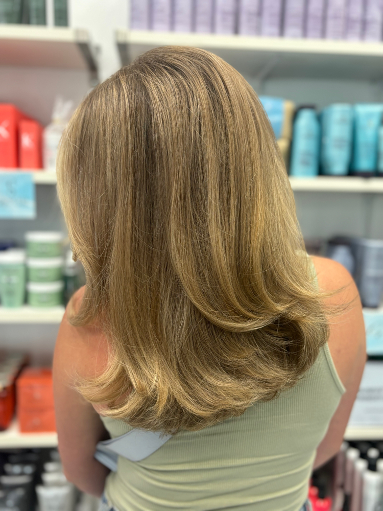 WOMAN’S HAIRCUT & STYLE