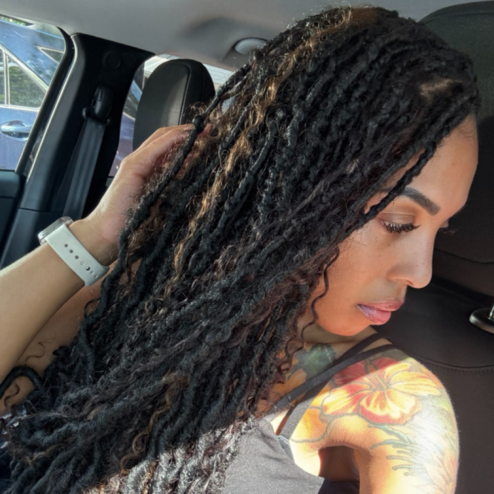 Distressed Faux Locs Touch Up Boho at Glam Braids in Marietta, GA