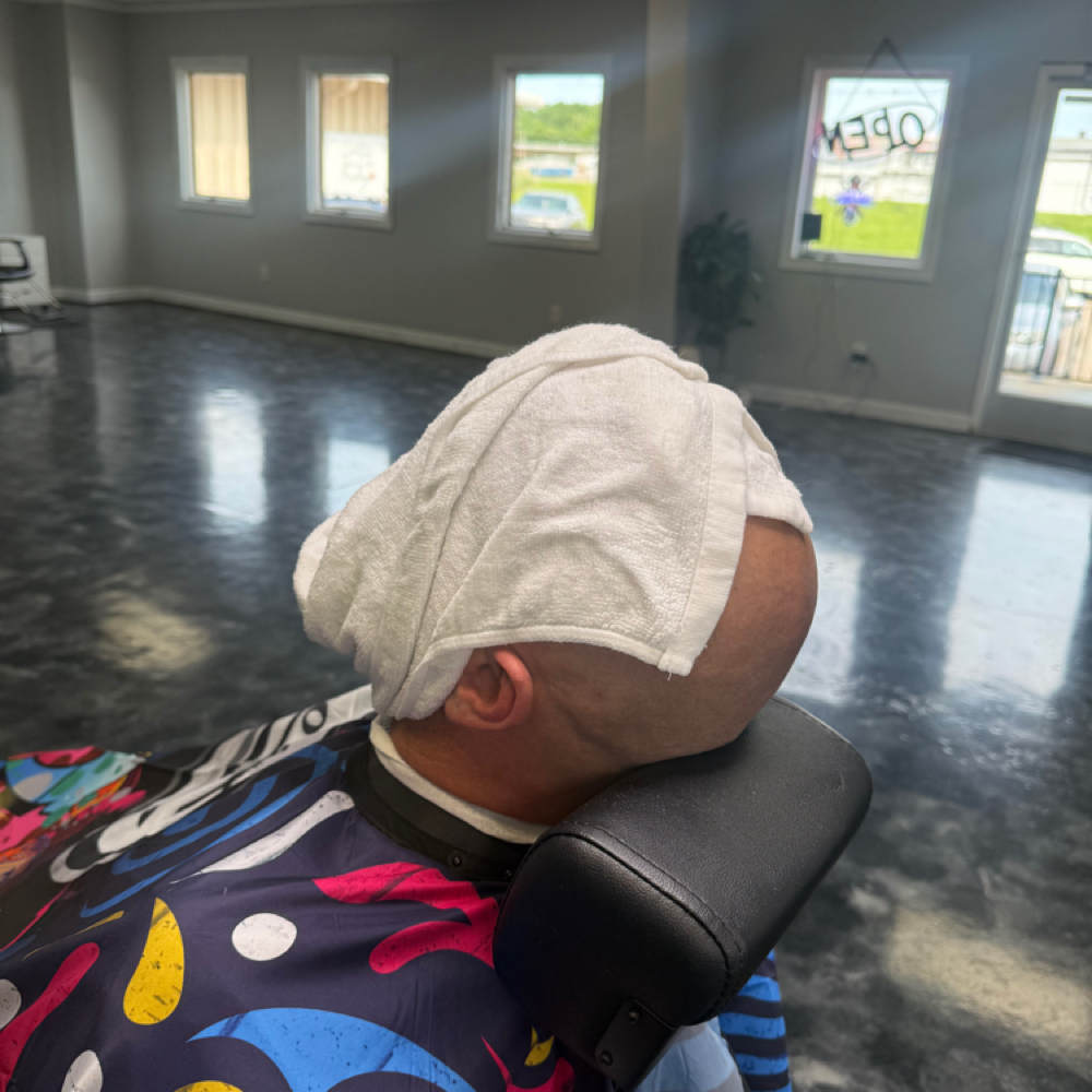 Hot Towel Shave at Corte Fuerte Barbershop in Muscatine, IA