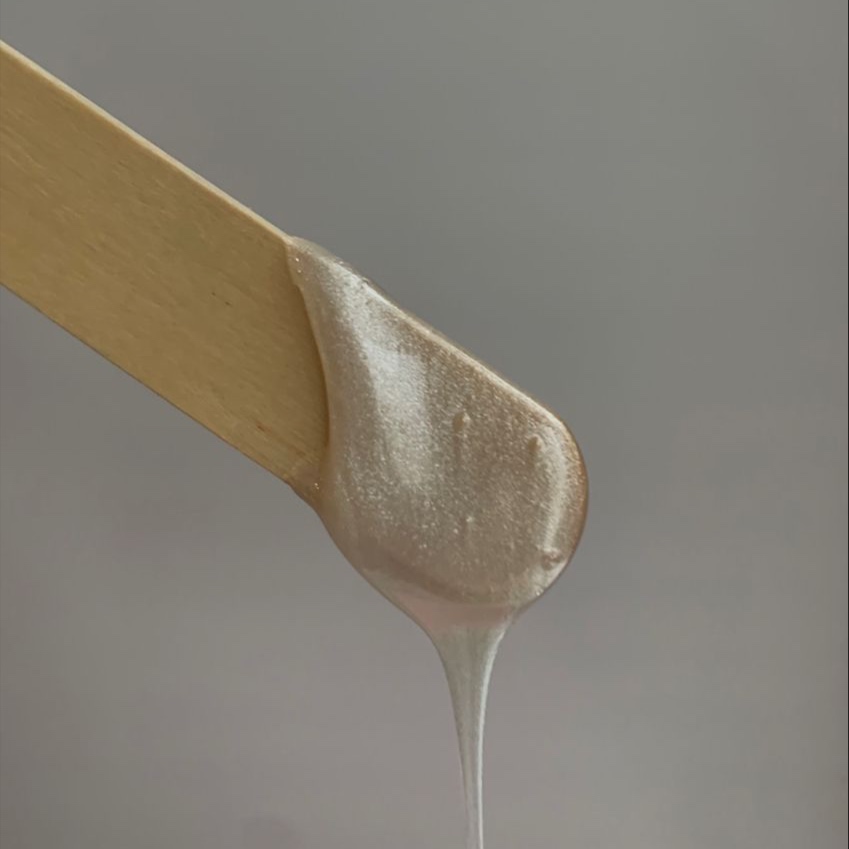 Chin Wax at QELA BEAUTY BAR in Chicago, IL