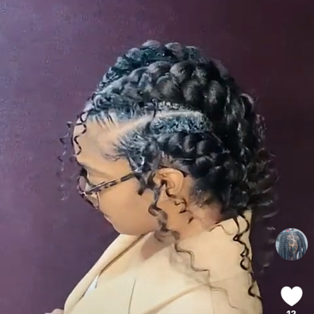 Butterfly Braids at Mame’s  hair braiding in Cordova, TN