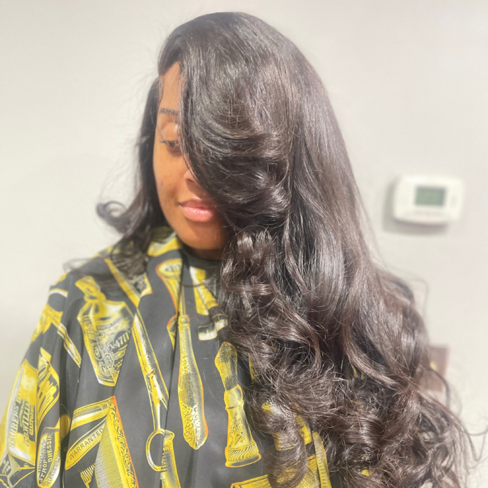 Closure sew in at Artistry of Braiding in Milwaukee, WI